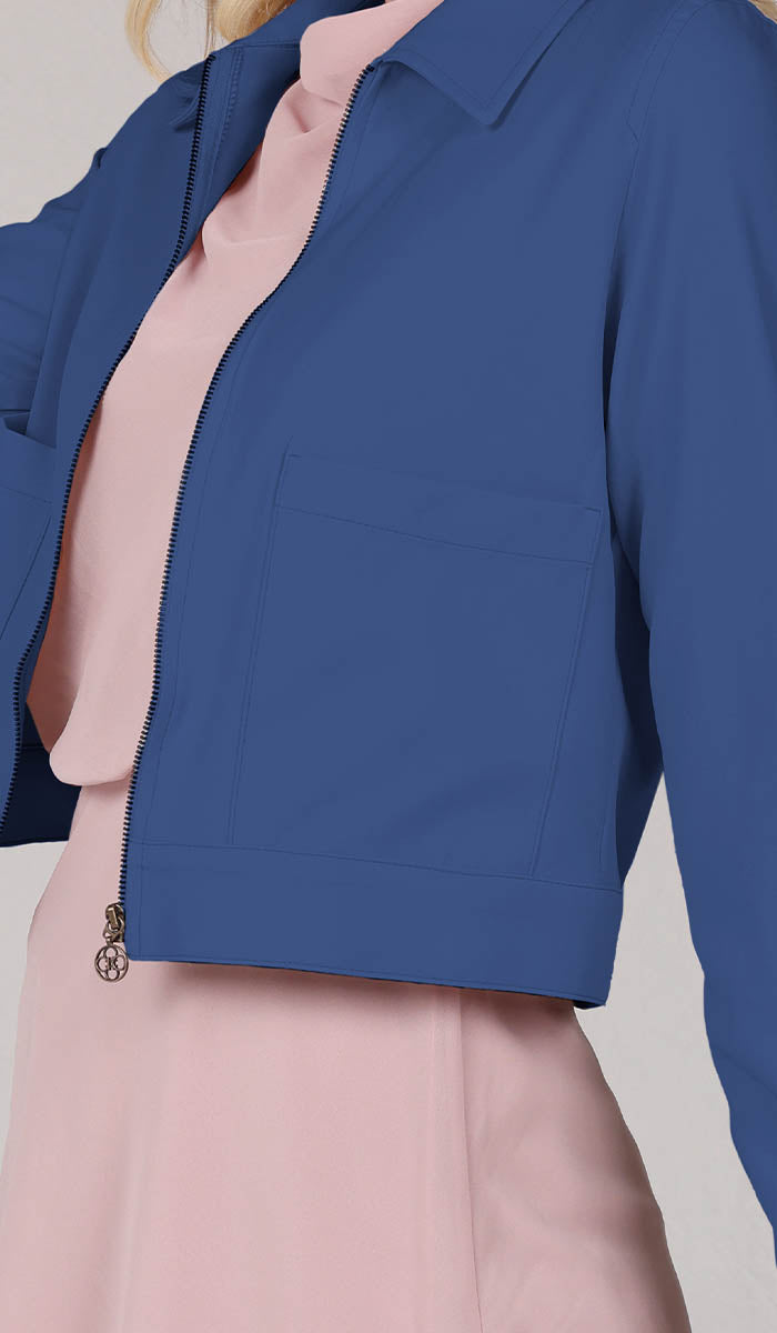 up close view of blue jacket pocket.