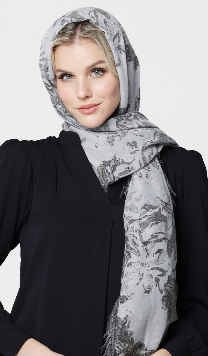 Woman wearing non-slip hijab in Gray. 