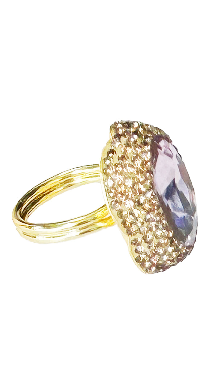 side view of oval hot pink jewel ring with gold shimmer crystals.