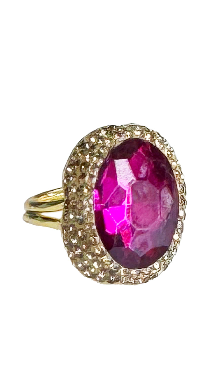 oval hot pink jewel ring with gold shimmer crystals.