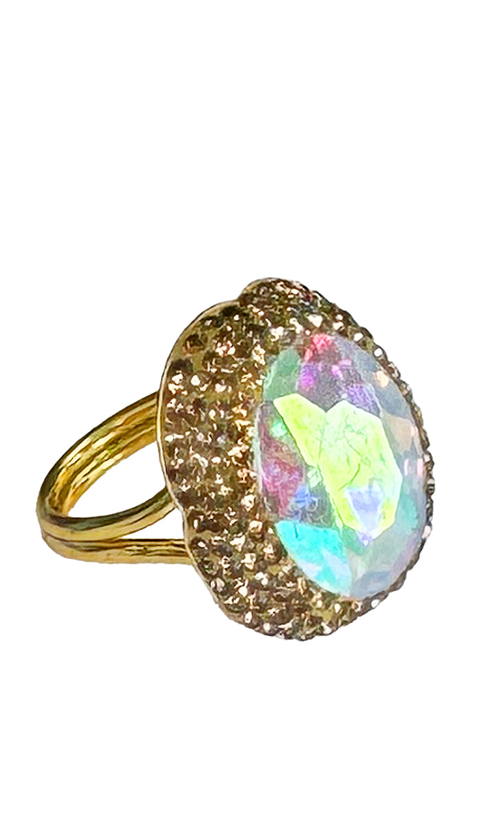 side profile view of iridescent oval ring with gold shimmer crystals.