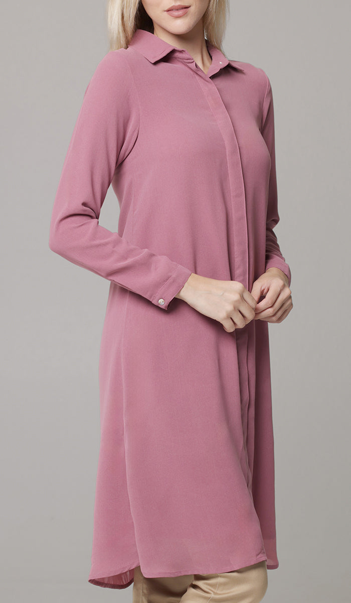 Side view of woman wearing modest Asra tunic in Rose. 