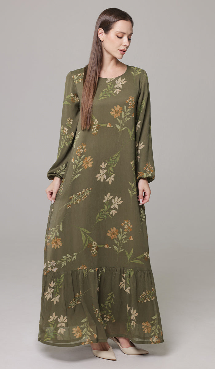 Woman wearing modest Batool maxi dress in Olive. 