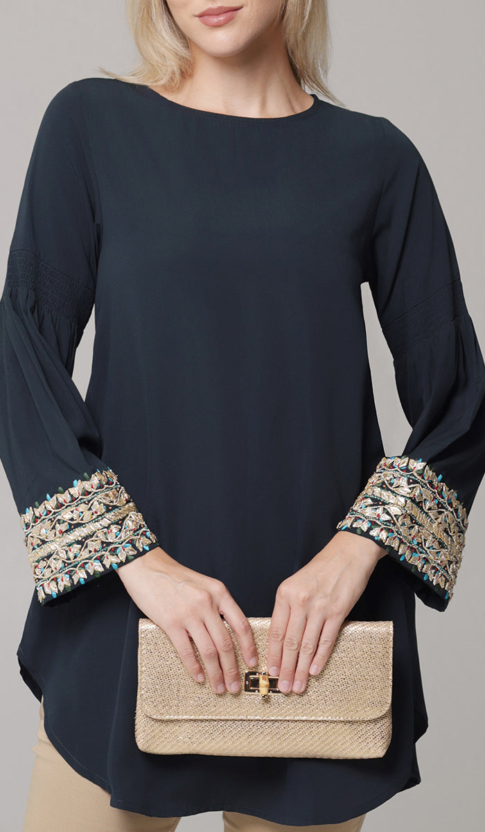 Woman wearing modest Esme tunic in Dark Teal. 