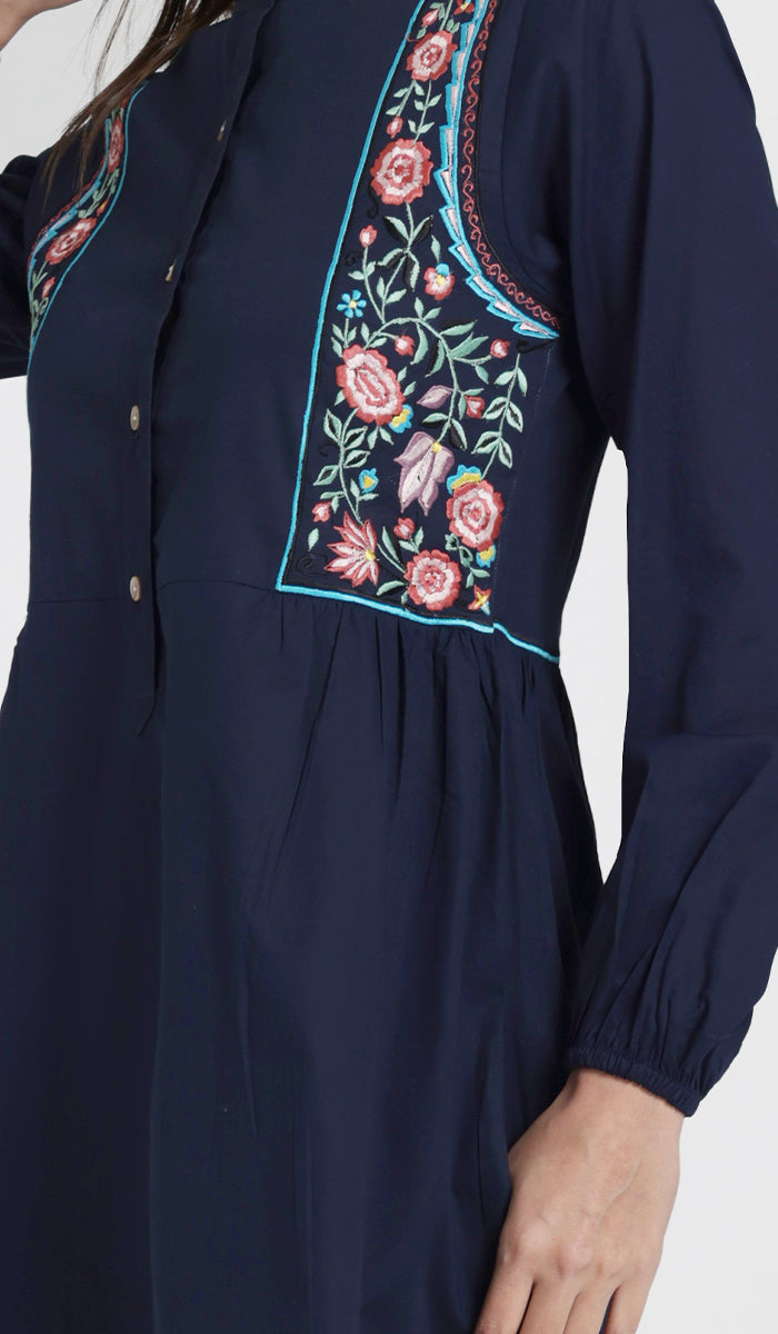 Embroidery details of modest Marzo tunic in Navy. 