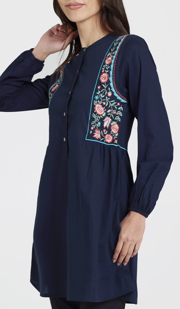 Woman wearing Marzo embroidered tunic in Navy. 