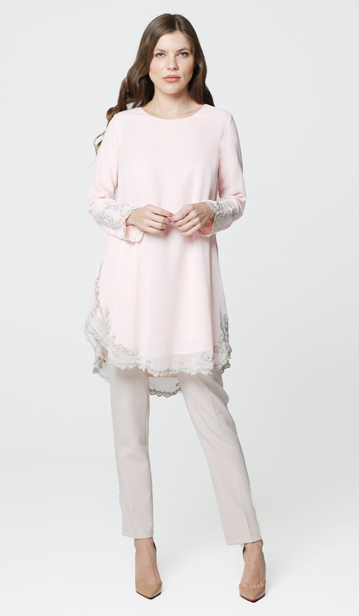 Model wearing blush pink Meena chiffon formal embroidered long modest tunic.