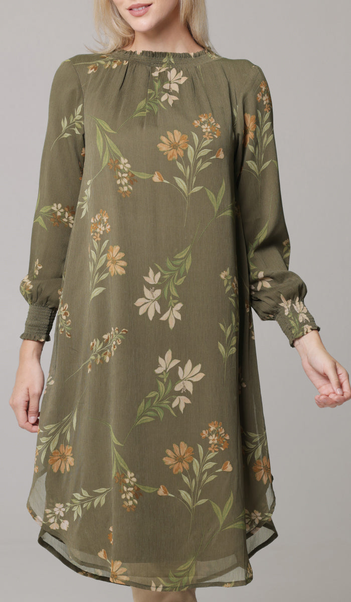 Woman wearing modest Miral midi tunic in Olive. 