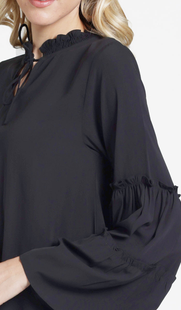 Sleeve details of Saba tunic in Black. 