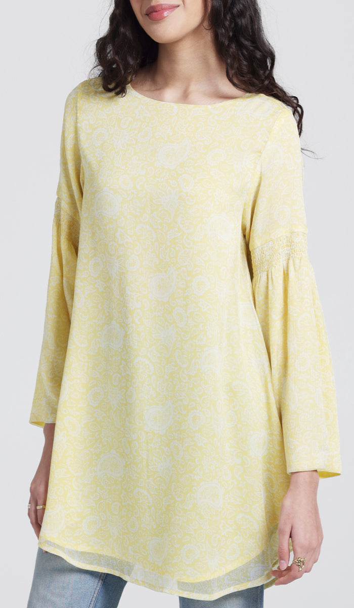 Model wearing yellow modest tunic. 