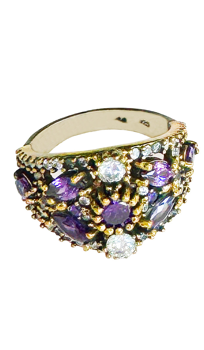 Sterling ring with purple and clear crystals.