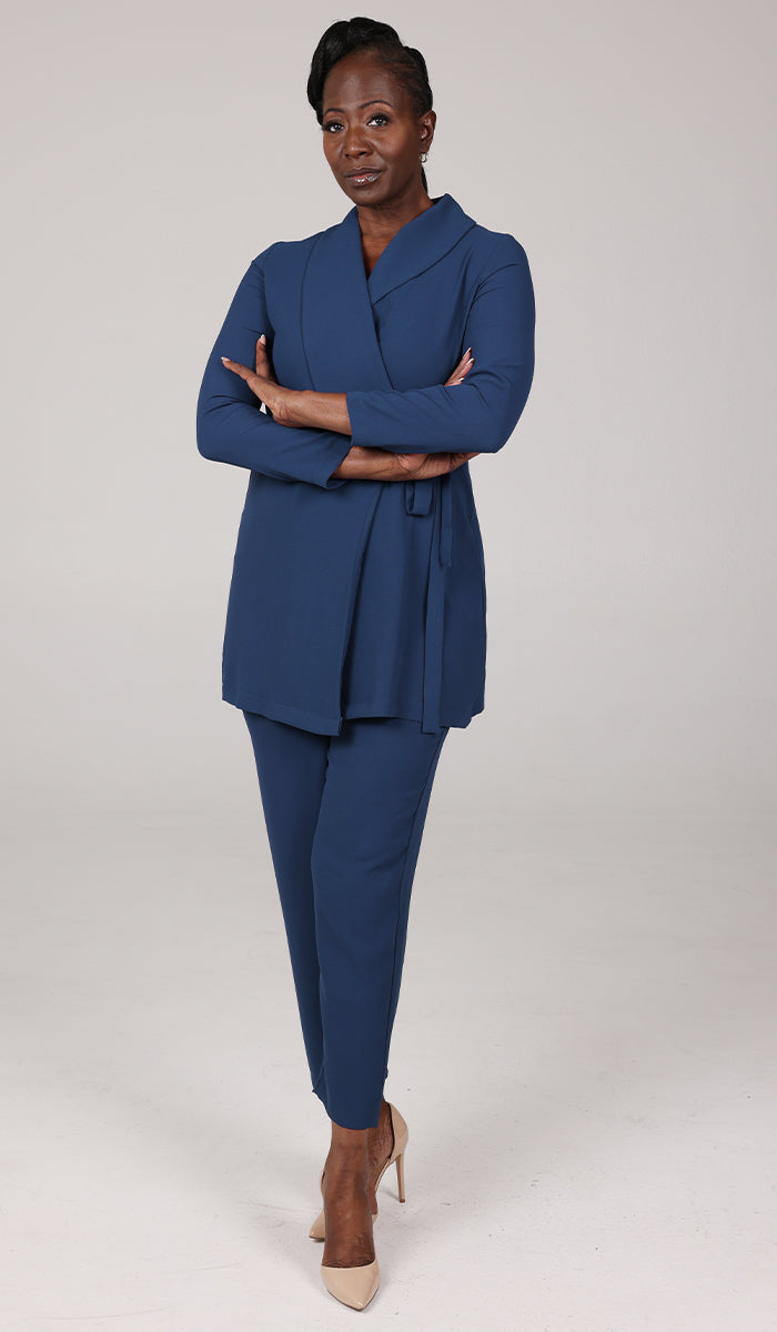 Woman with crossed arms wearing modest Abeer set in Marina Blue. 