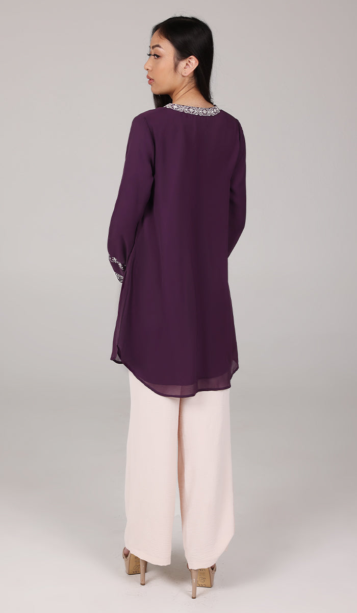 Back view of Amalie tunic in Eggplant. 