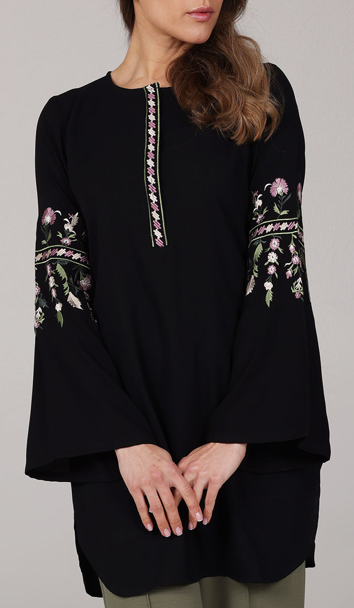 Model wearing modest Gulzar embroidered tunic in Black. 