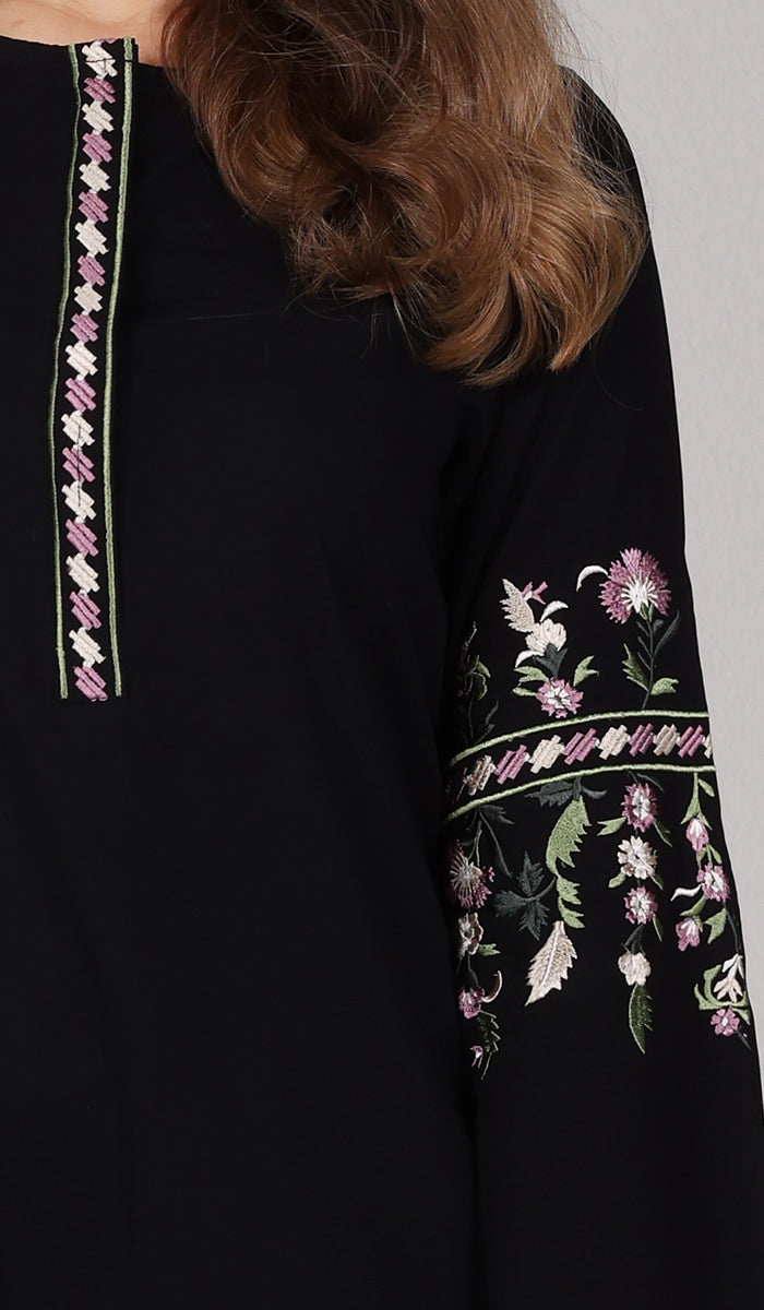 Close up details of embroidery on Gulzar tunic in Black. 