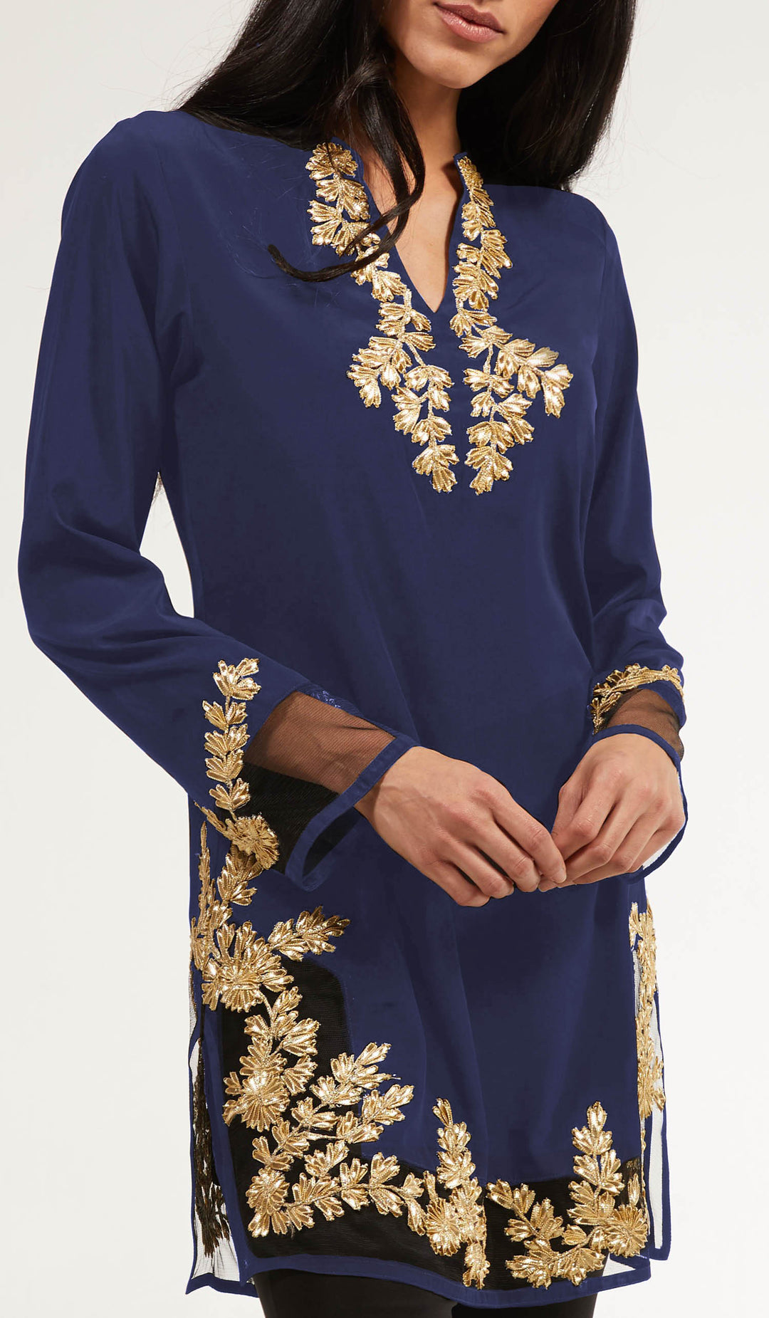 Woman wearing Mahnaz embellished tunic in Sapphire. 