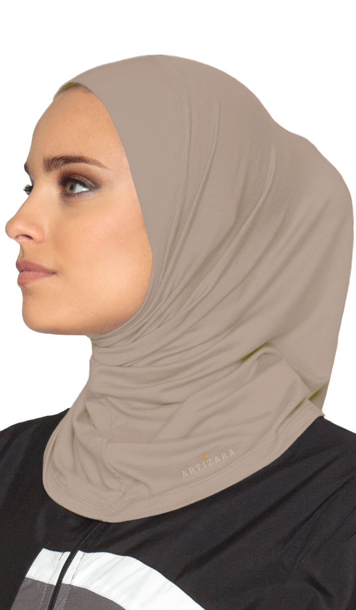 Side view of woman wearing sports hijab in Mocha.