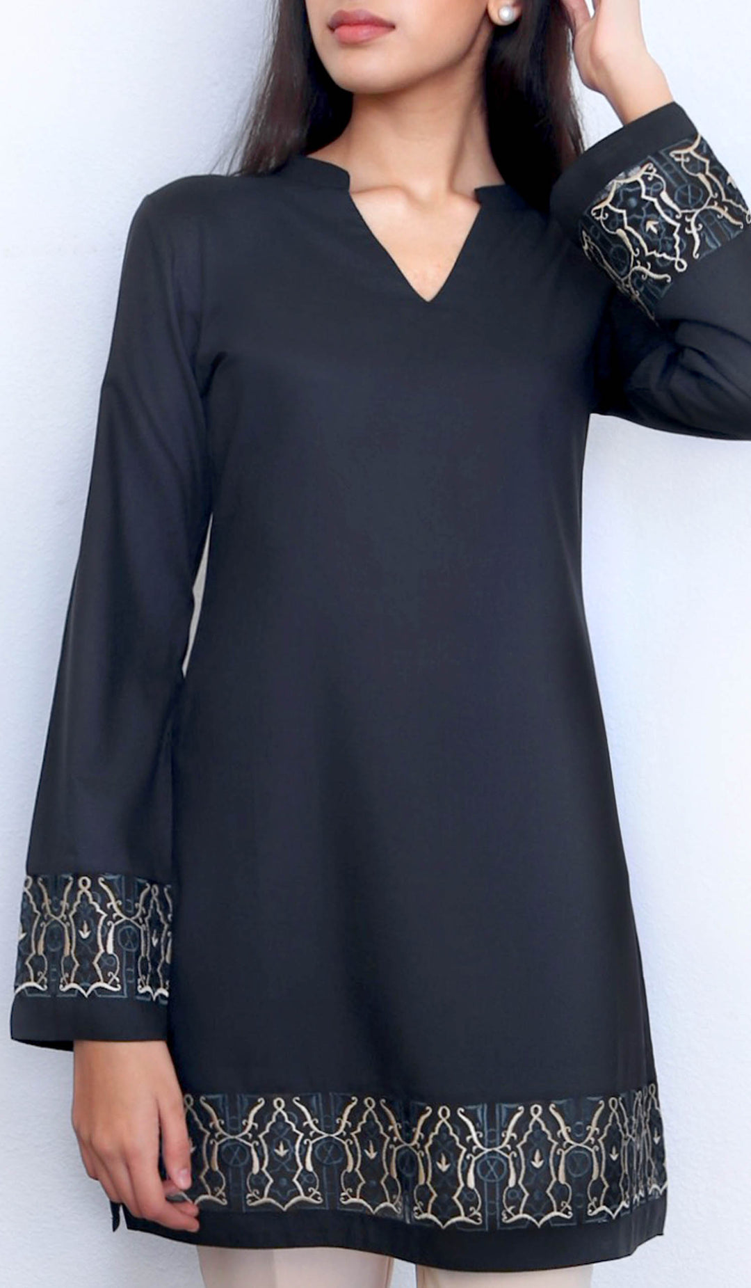 Woman wearing modest Selma tunic in Black.