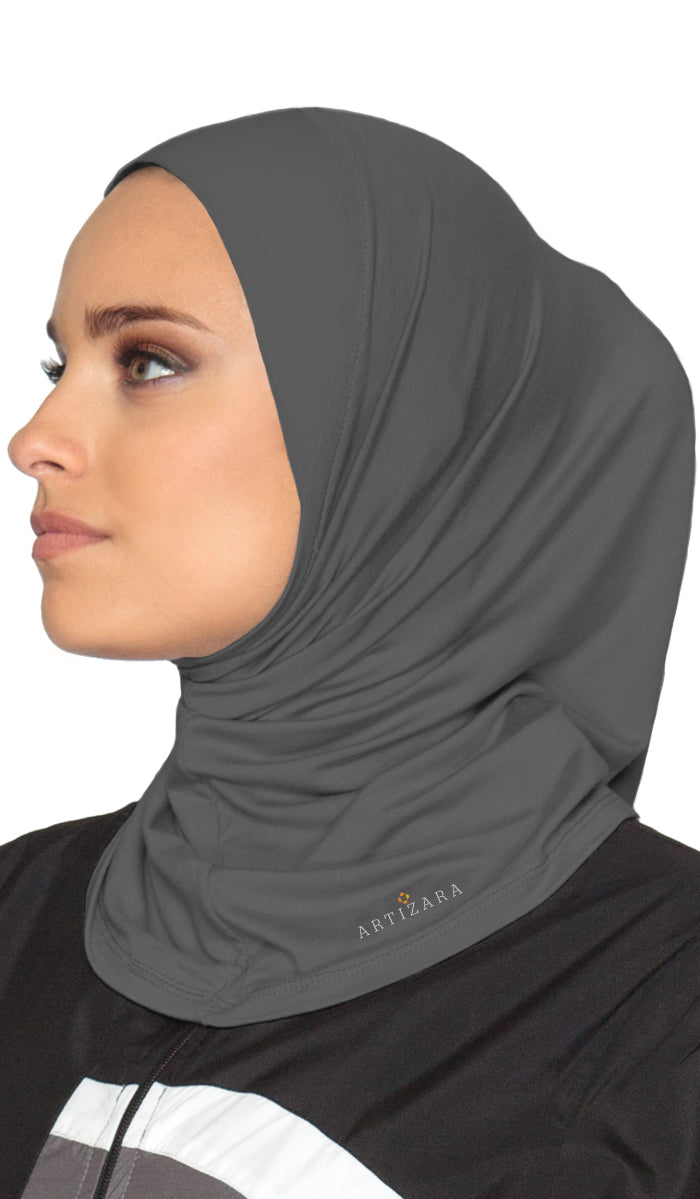 Side view of woman wearing one piece sports hijab in Charcoal Grey.