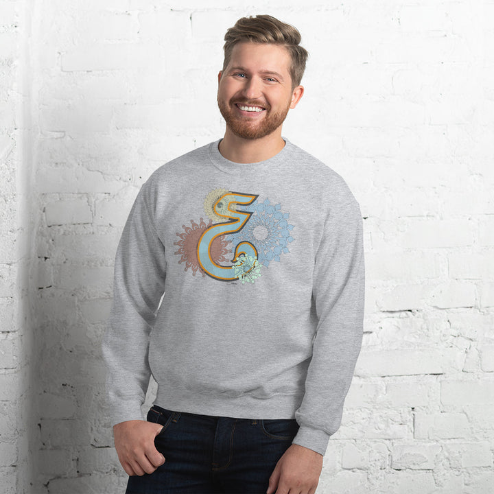 man wearing a gray pullover sweater with design.